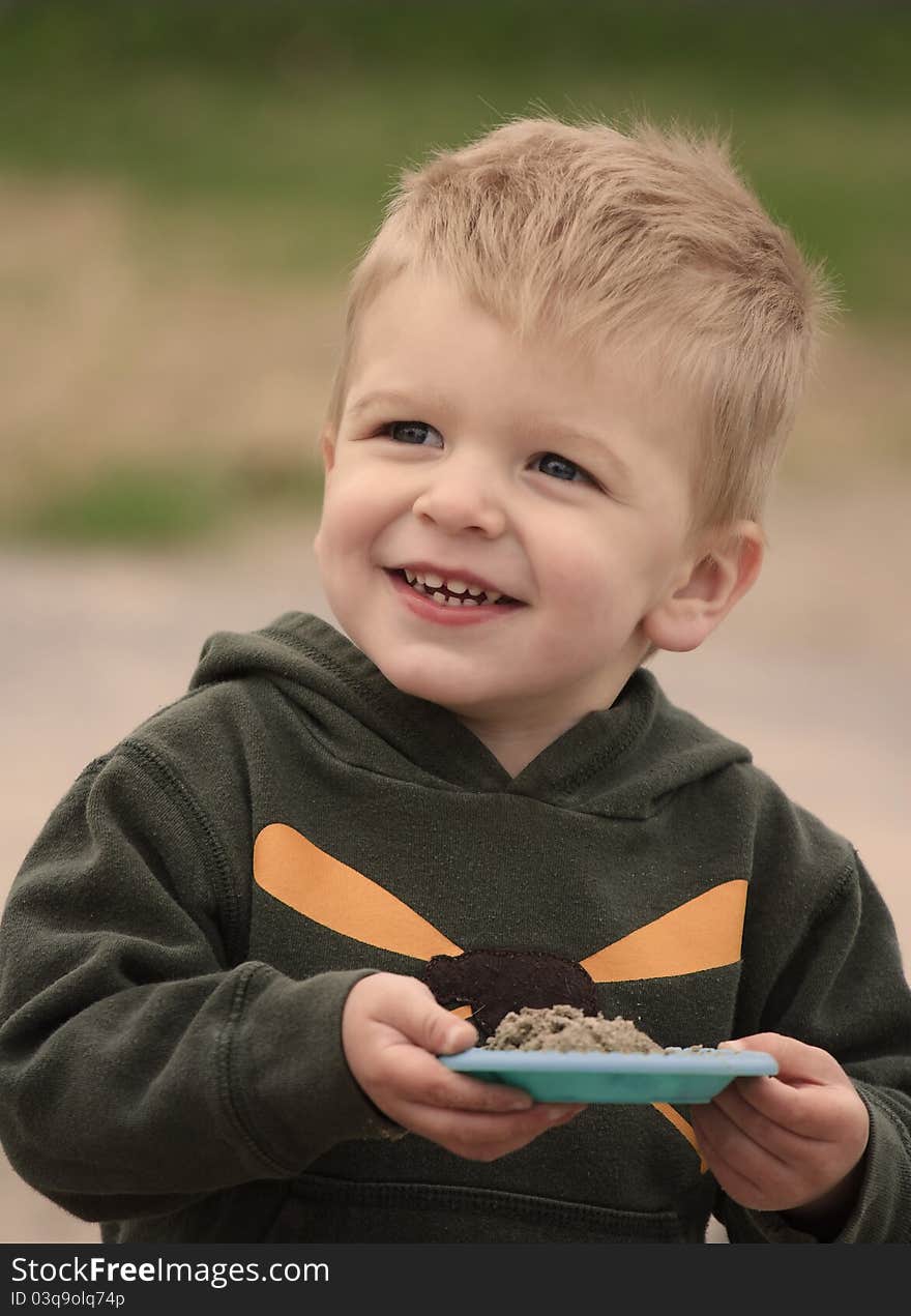 A child offers a treat to his parents. A child offers a treat to his parents