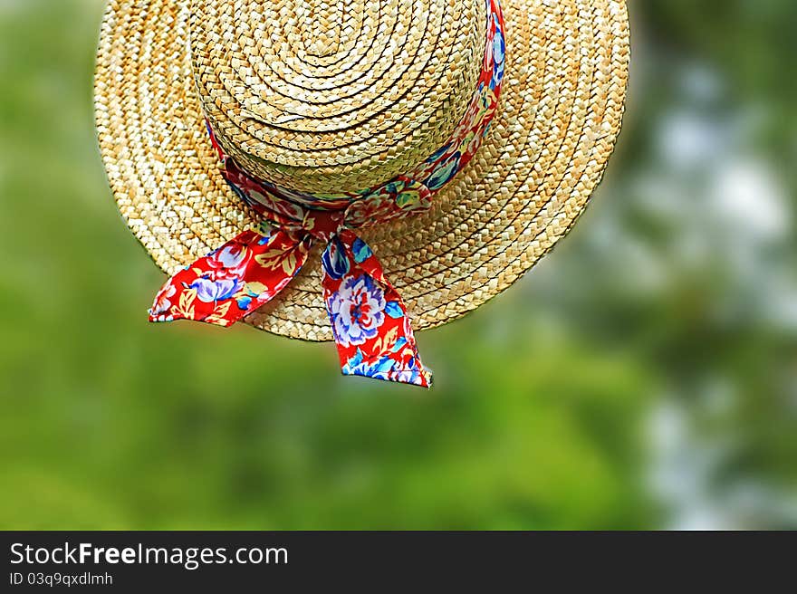 Lovely Summer straw hat in the garden