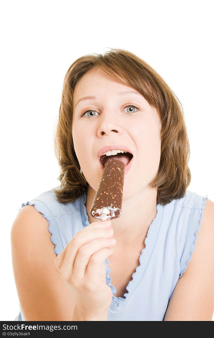 Woman eating ice cream on a white background.