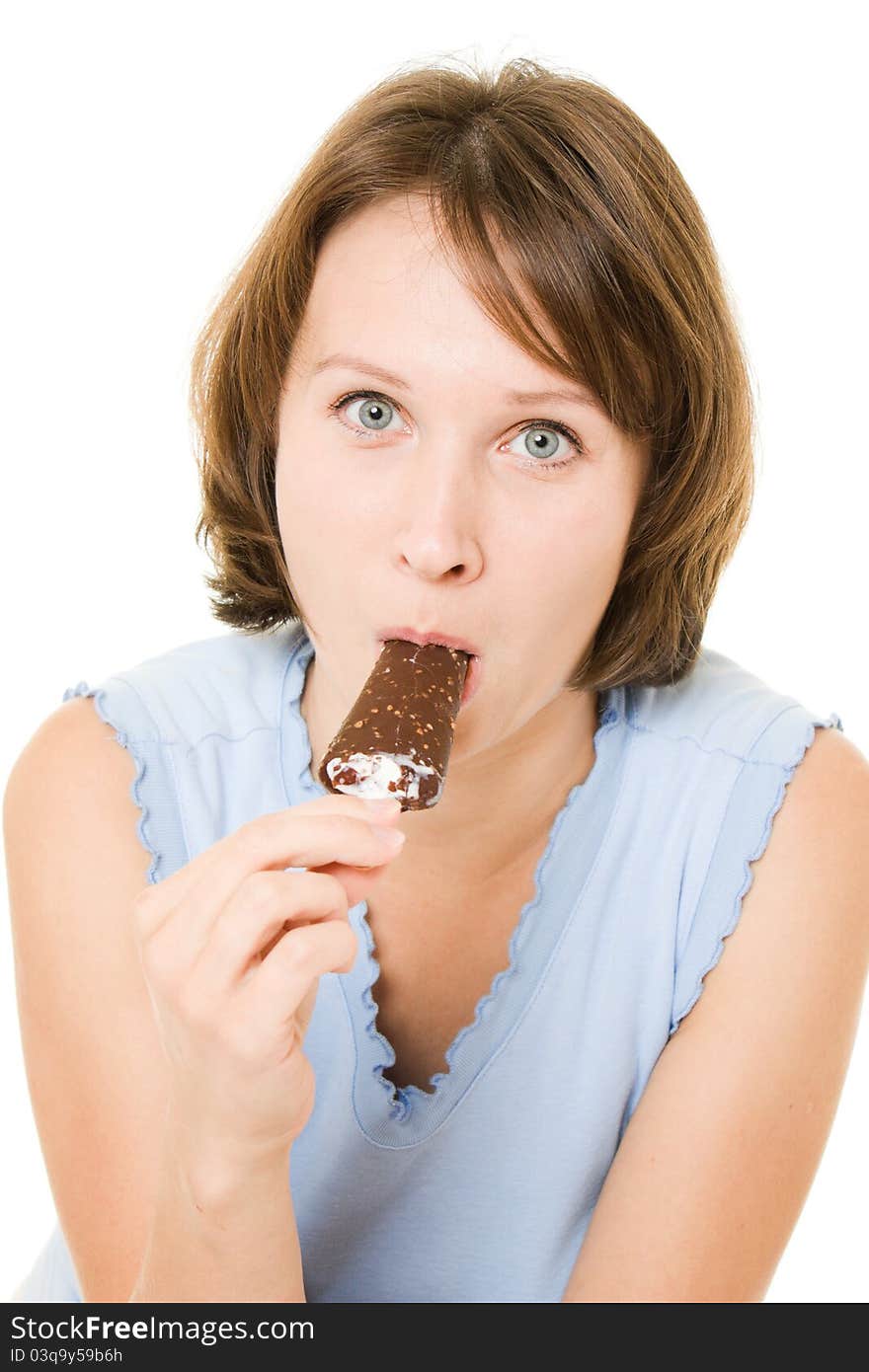 Woman eating ice cream on a white background.