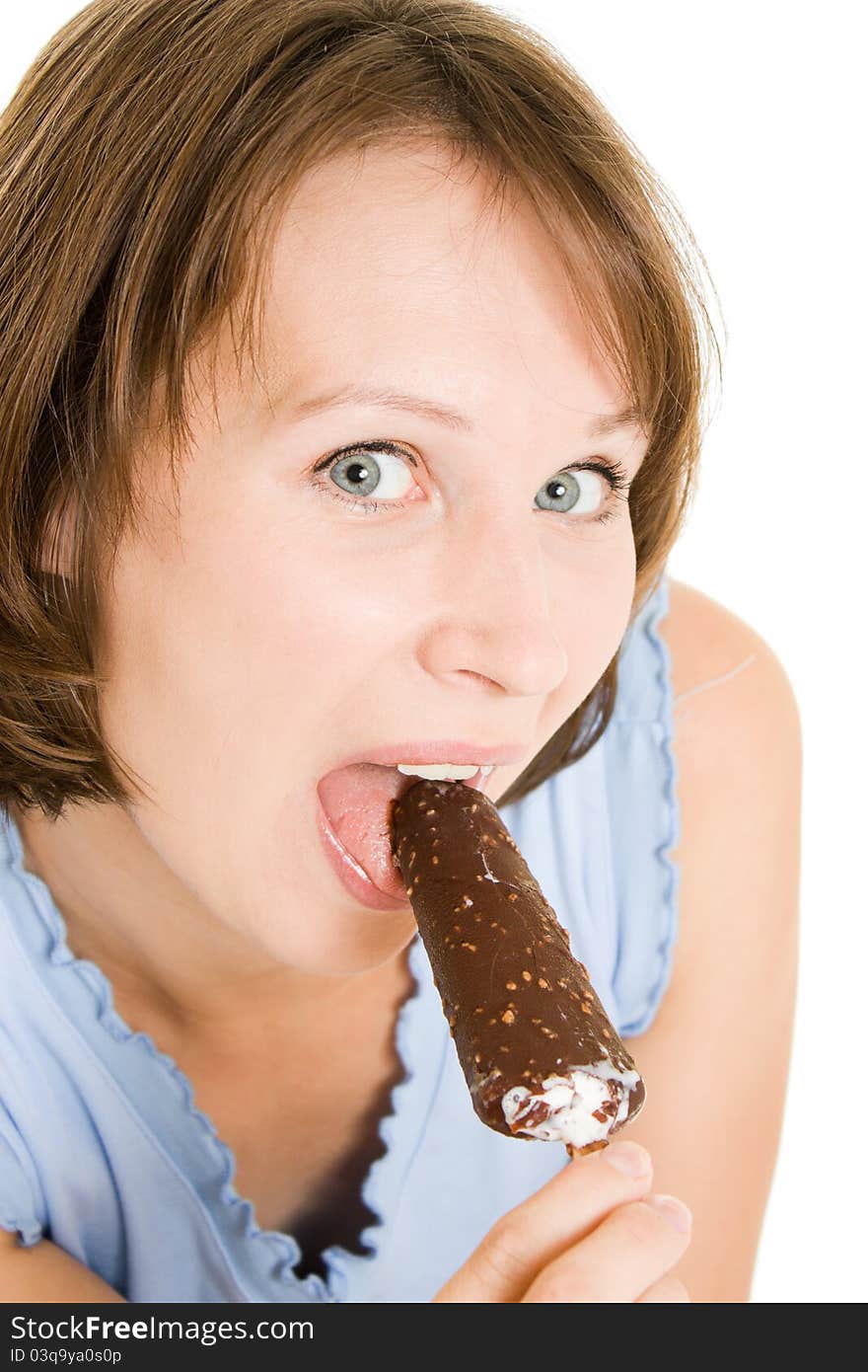 Woman eating ice cream on a white background.