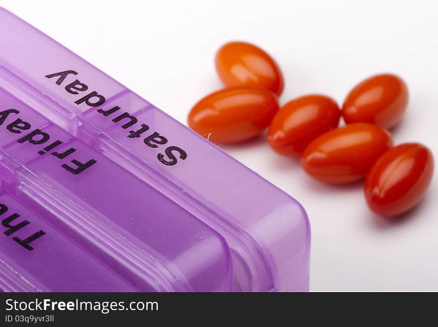 Box for medications showing days of the week. Box for medications showing days of the week.