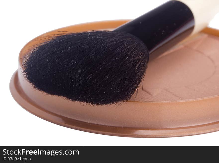 Black powder brush and brown powder isolated on a white background. Black powder brush and brown powder isolated on a white background.