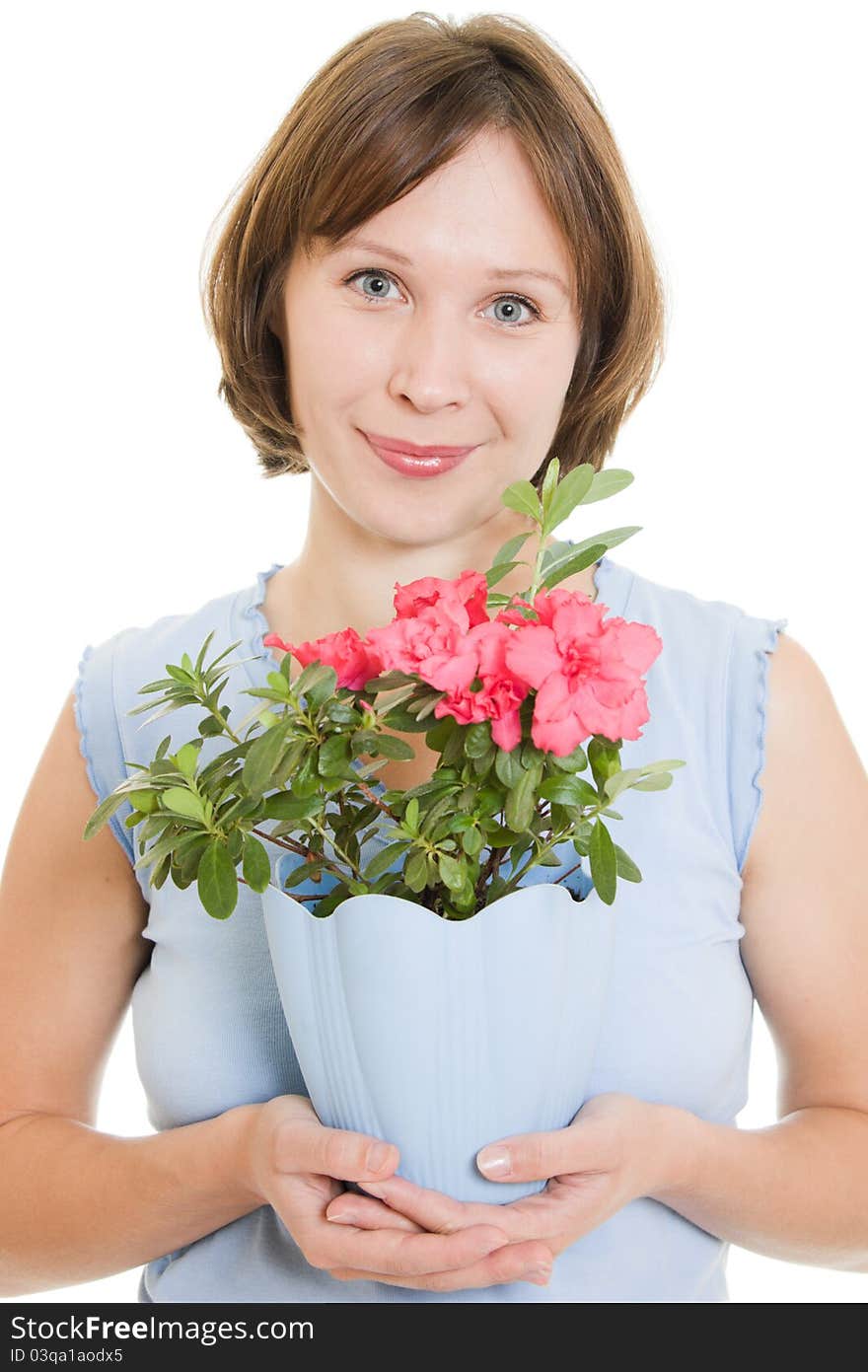 Smelling girl with flower on a white background. Smelling girl with flower on a white background.