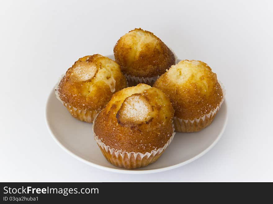 Plate with various sugar muffins. Plate with various sugar muffins