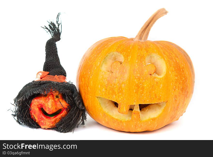 Pumpkin and witch on Halloween on a white background