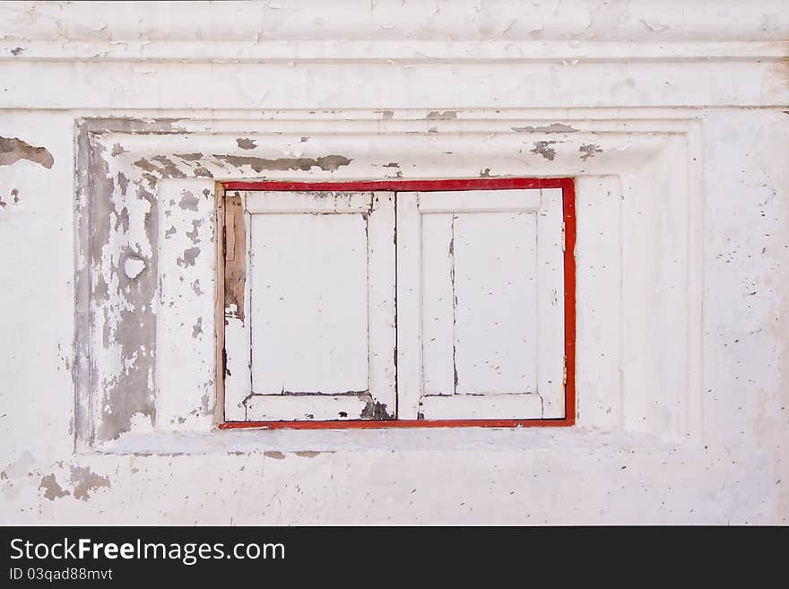 Old small window under the temple