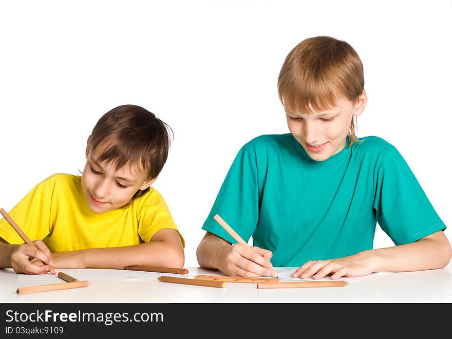 Portrait of a family drawing at table. Portrait of a family drawing at table