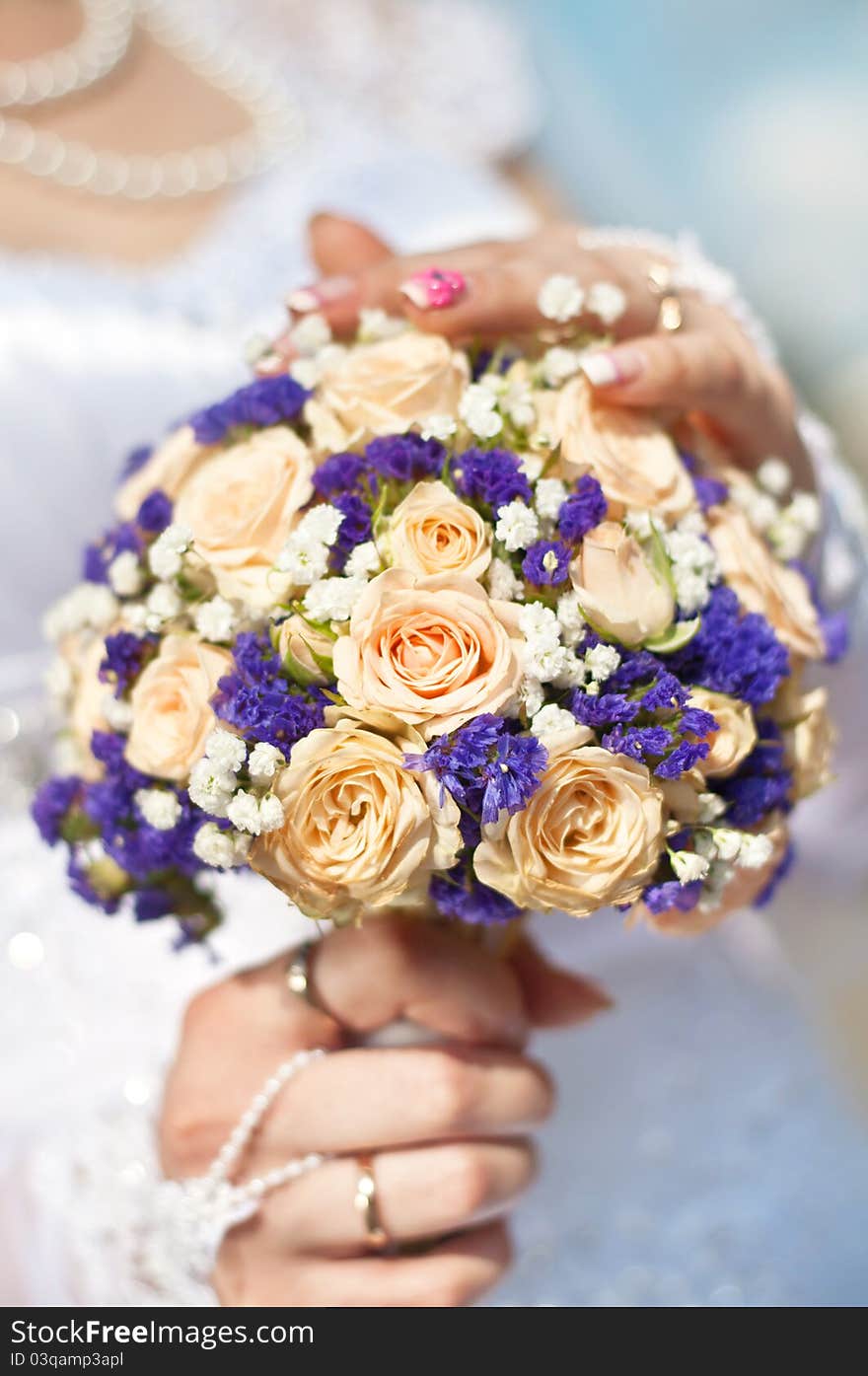 Bride holding beautiful  wedding flowers bouquet. Bride holding beautiful  wedding flowers bouquet