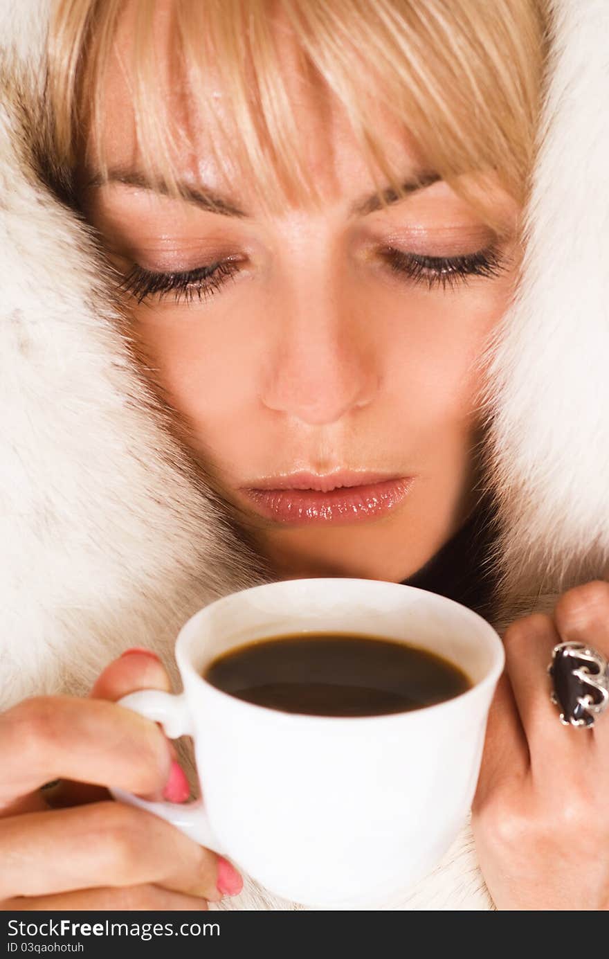 Portrait of a cute girl with a cup of coffee. Portrait of a cute girl with a cup of coffee