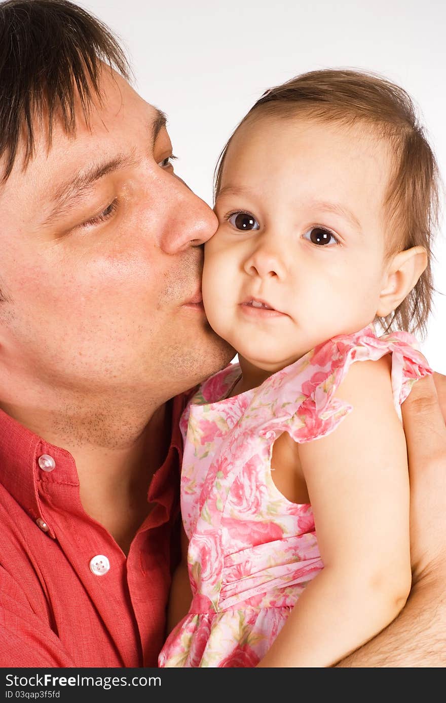 Cute dad with his daughter on a white. Cute dad with his daughter on a white