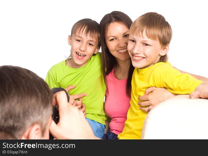 Dad with camera taking pictures of his family