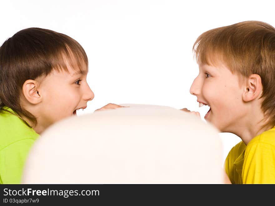 Two cute boys on a white background. Two cute boys on a white background