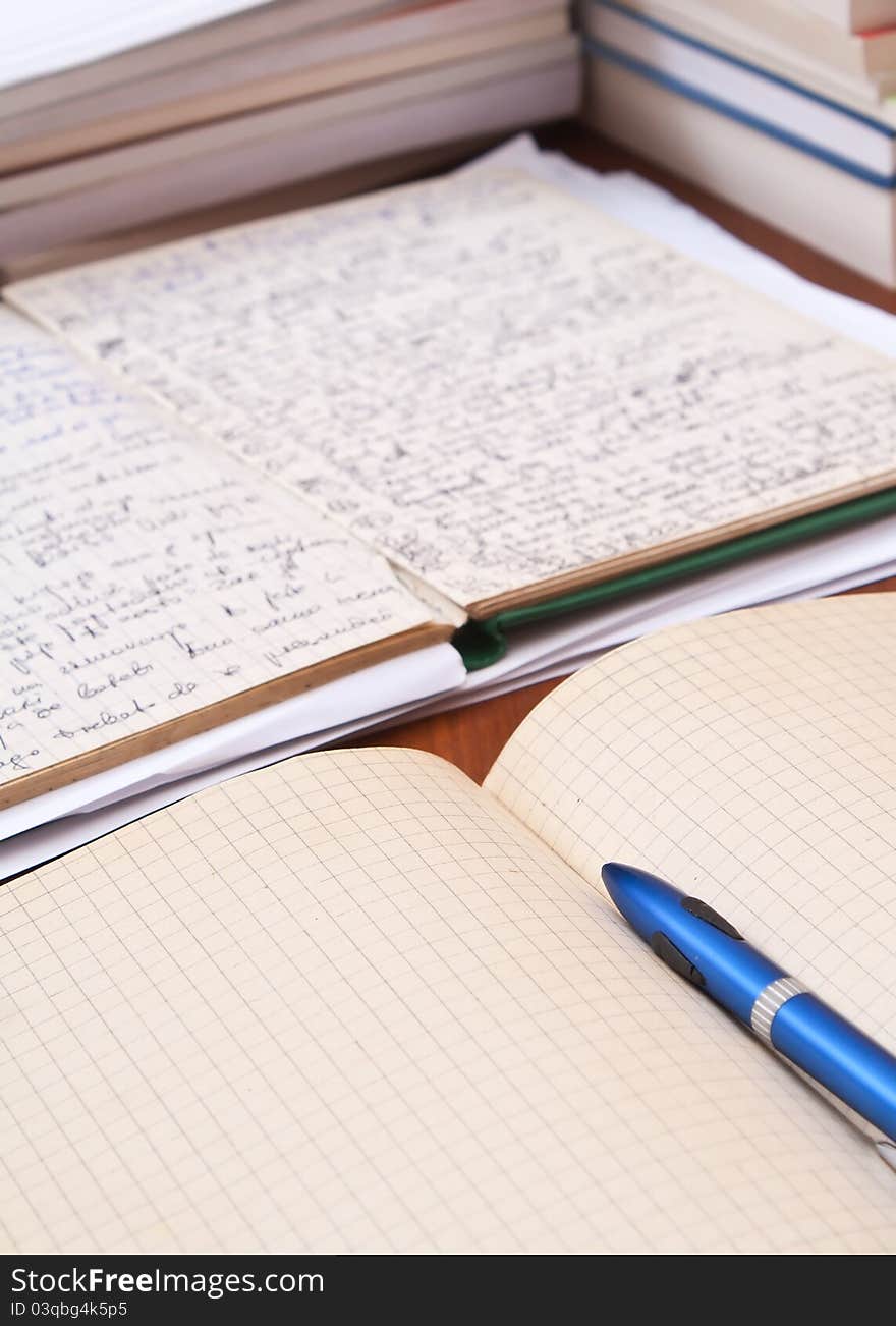 Books and volumes on the table