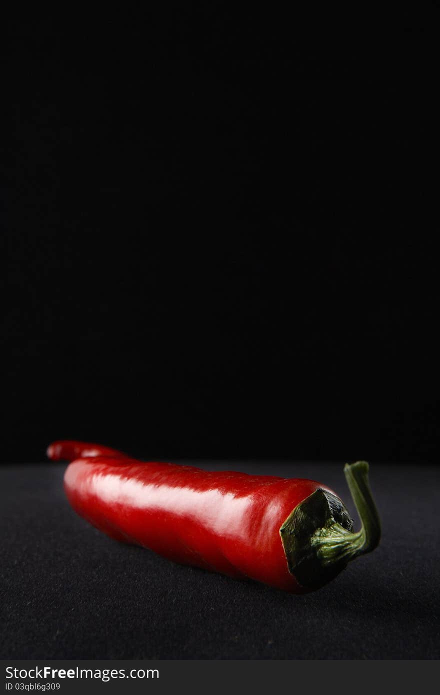 Red Hot Pepper in black background