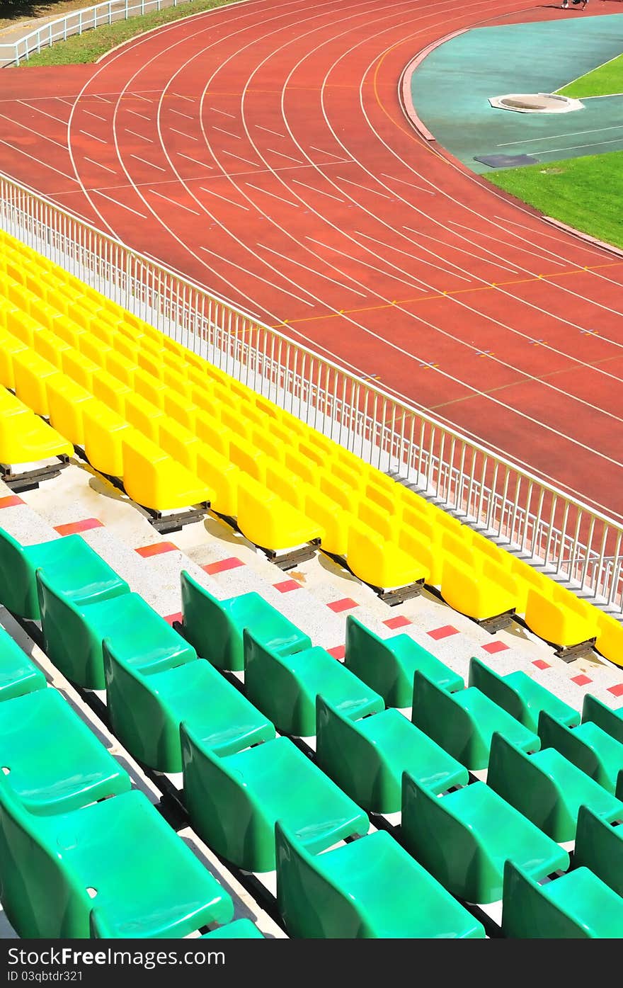 Rows Of Plastic Chairs At The Stadium