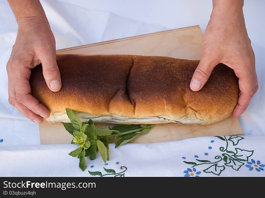 Middle woman with strudel in hands