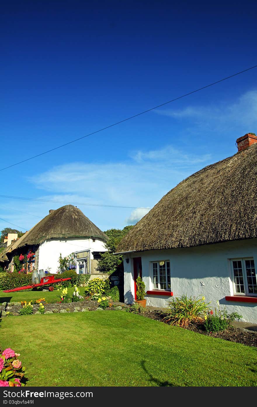 Old Style Irish Cottage Adare Co. Limerick on a sunny summers day