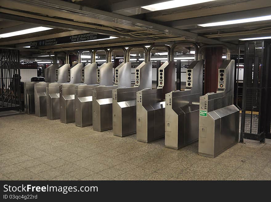 Many turnstile in Manhattan subway station. Many turnstile in Manhattan subway station