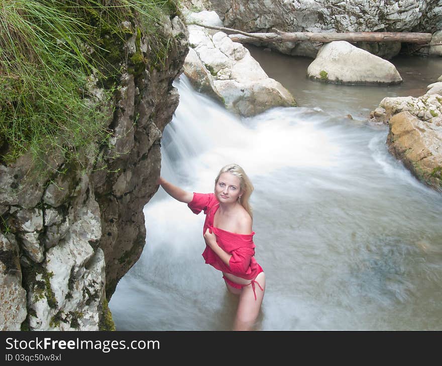 Sexy Blonde Near Waterfall