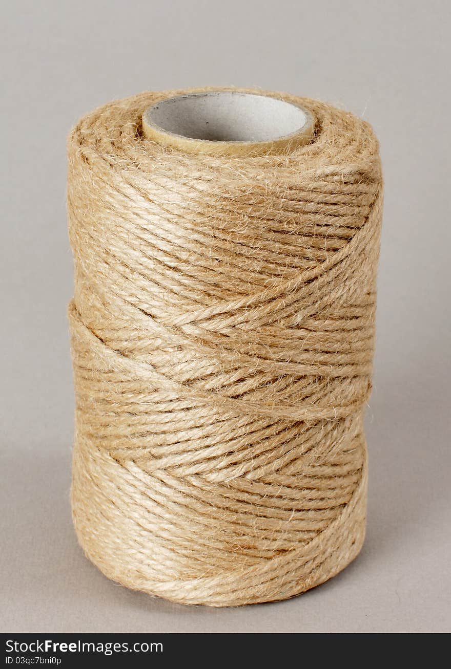 Twine for construction, hardwearing fabric, roll of twine,
