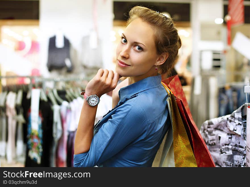 Young Girl Buying Clothes