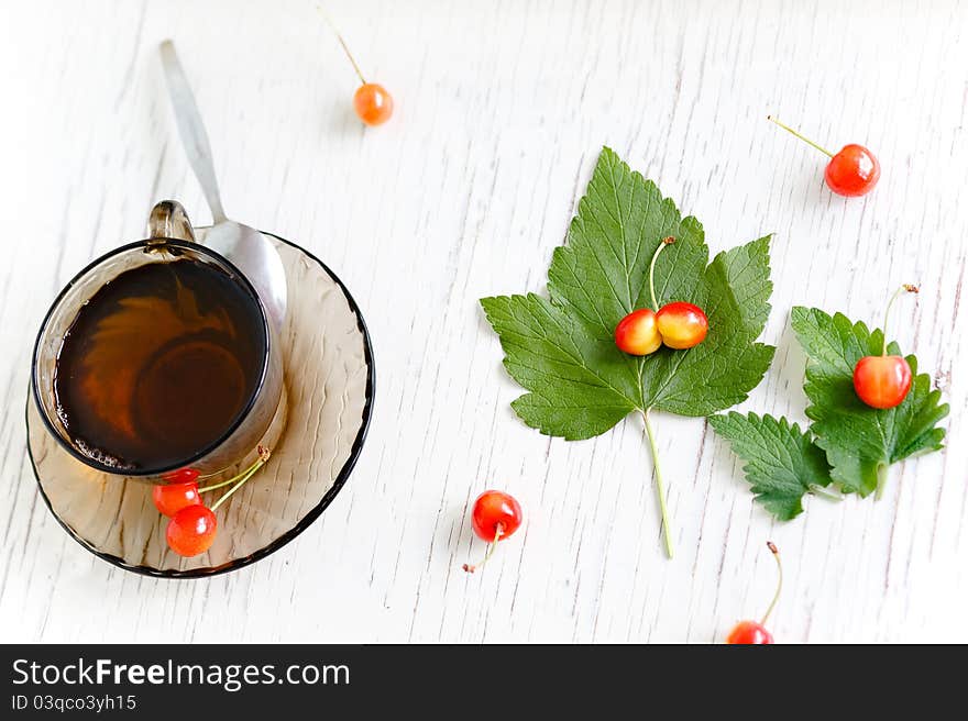 Herbal tea and leaves on the table