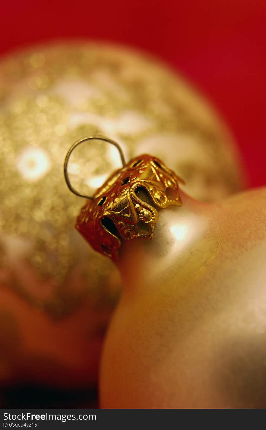 Close up of gold Christmas tree ornaments