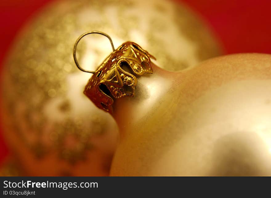 Close up of gold Christmas tree ornaments