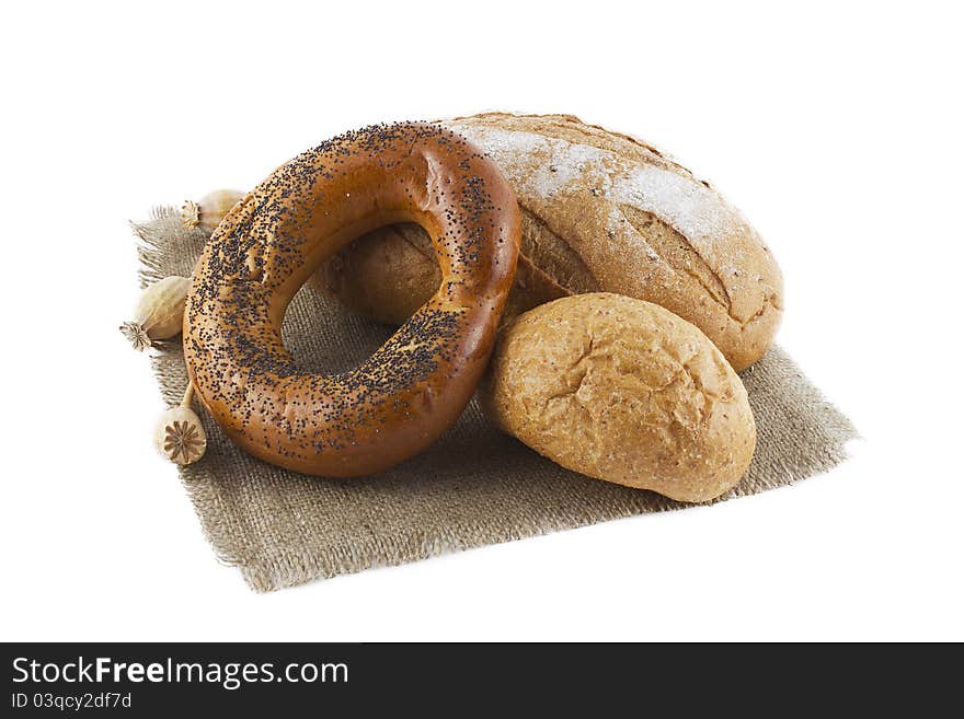 Loaves of bread isolated over white background