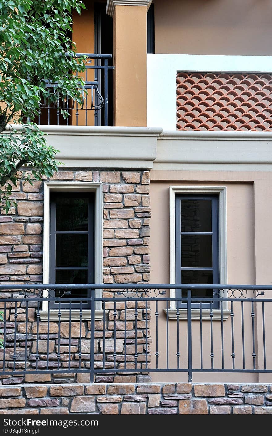 A small villa building out looking, including wall, windows and corridor, shown as architecture geometric and shape, different color and texture. A small villa building out looking, including wall, windows and corridor, shown as architecture geometric and shape, different color and texture.