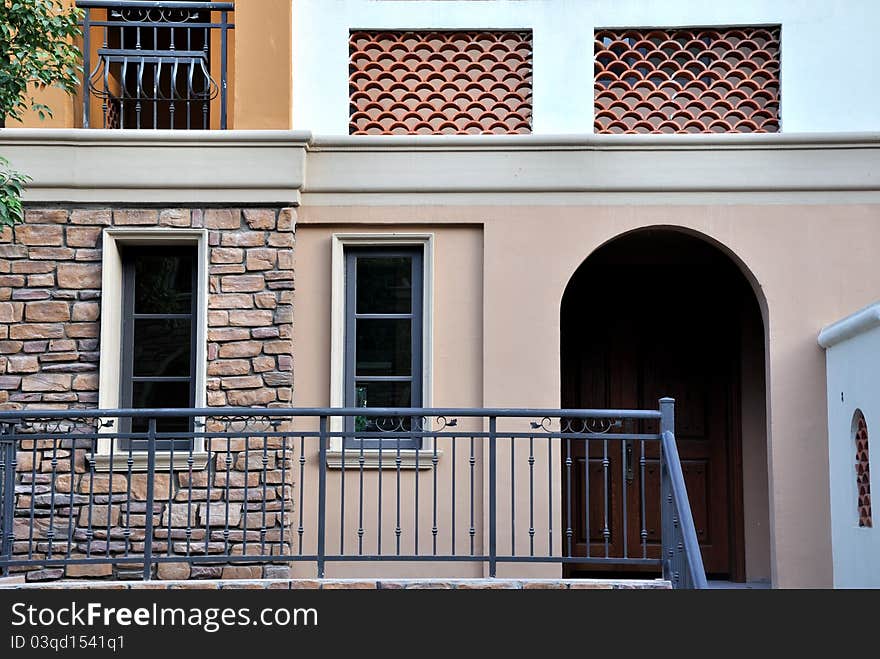 A small villa building out looking, including wall, windows and corridor, shown as architecture geometric and shape, different color and texture. A small villa building out looking, including wall, windows and corridor, shown as architecture geometric and shape, different color and texture.