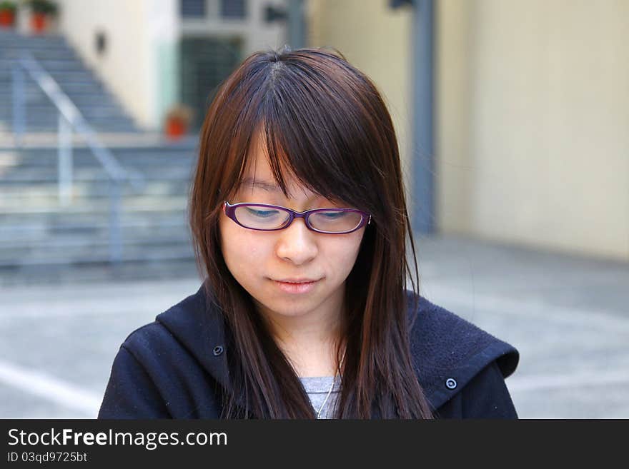 Asian Girl Smiling In School