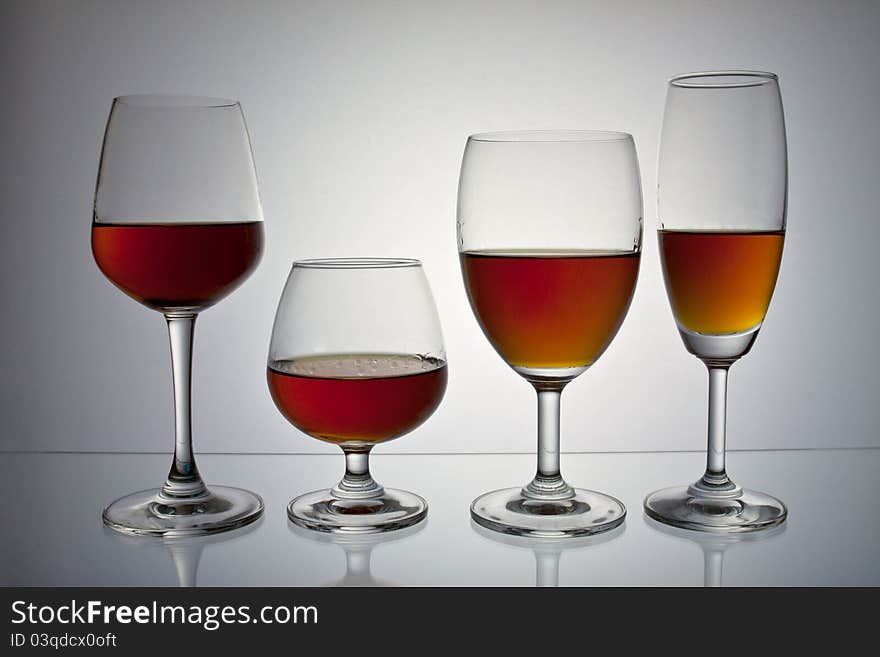 Empty wine glass on gray background