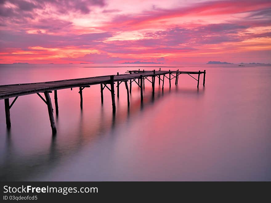 Nice seascape of ocean bridge at twilight time.