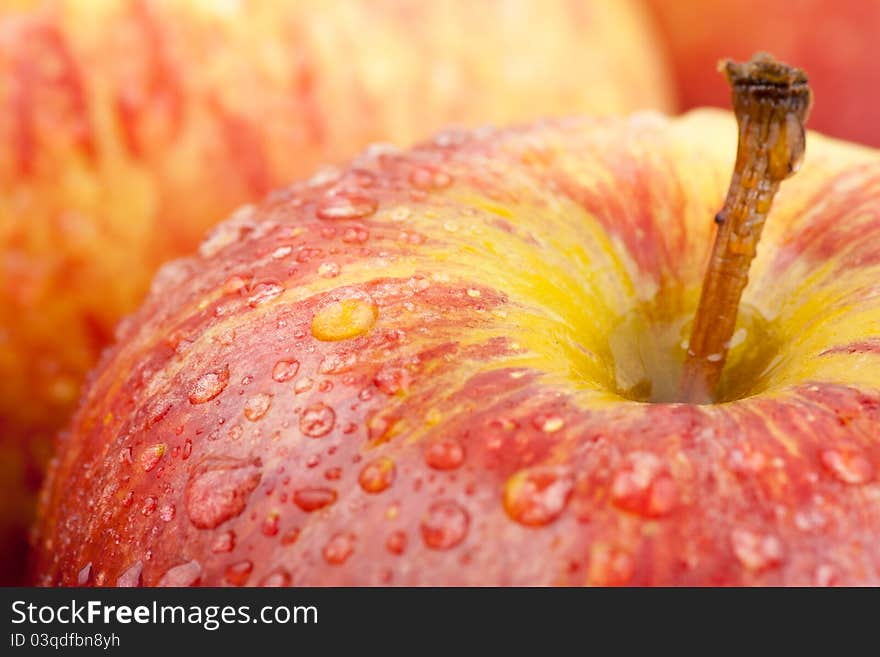 Closeup of water droplet on Gala apple