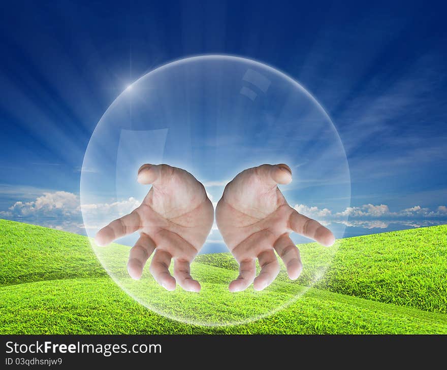 Help concept by hands in air bubble with nature background.