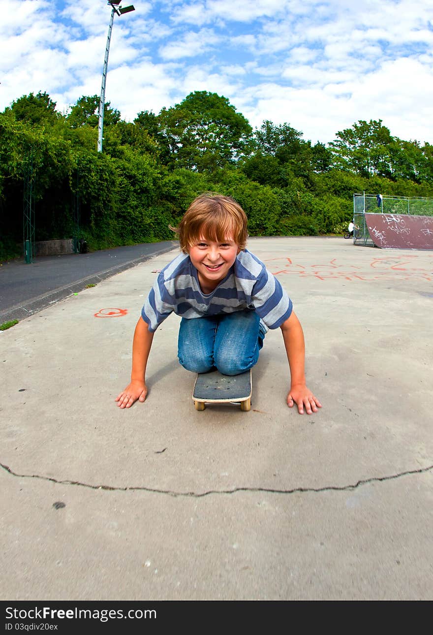 Boy enjoys skating at the skate