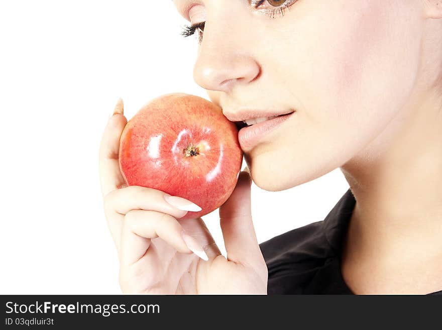 Young woman with apple in studio