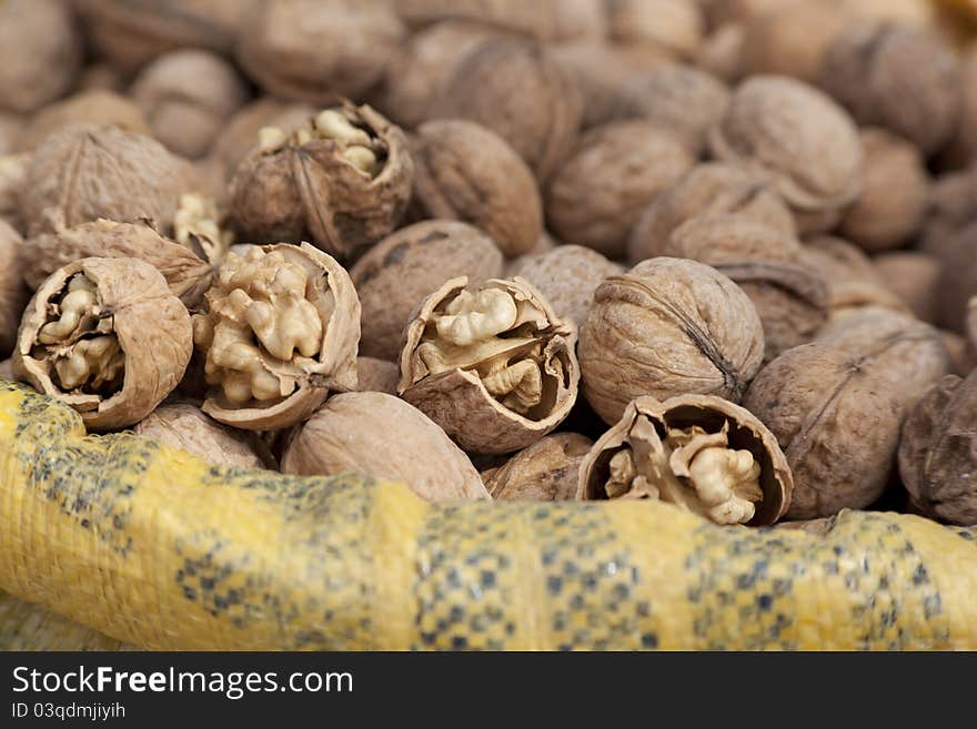 Walnuts close up shot in a local market. Natural light. Walnuts close up shot in a local market. Natural light.