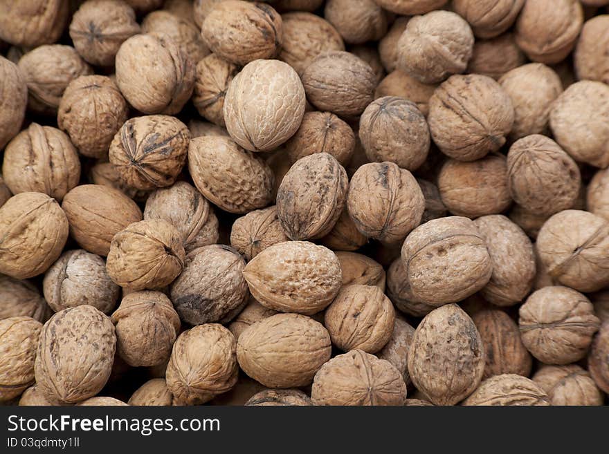 Walnuts close up shot in a local market. Natural light. Walnuts close up shot in a local market. Natural light.