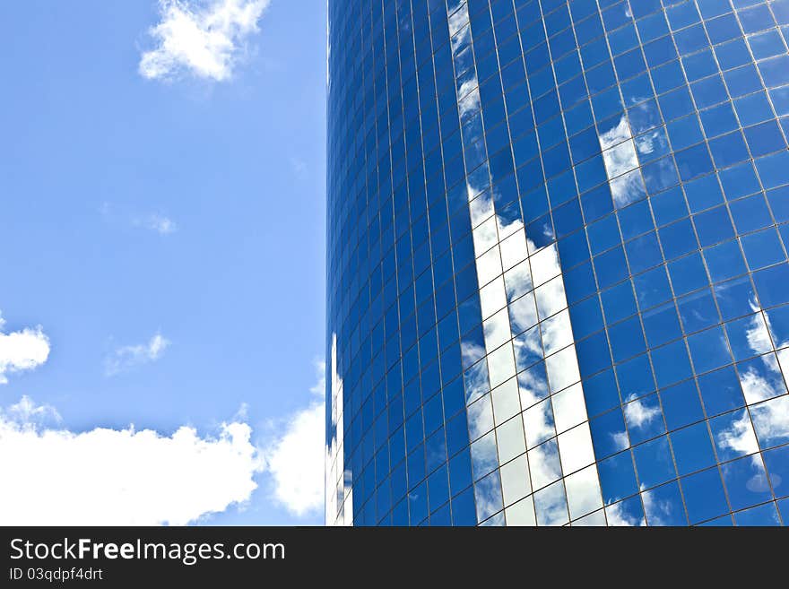 Facade of Skyscraper with reflection of sky in New York