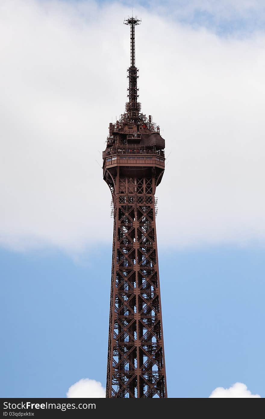 Apex of Eiffel tower on the background sky. Apex of Eiffel tower on the background sky