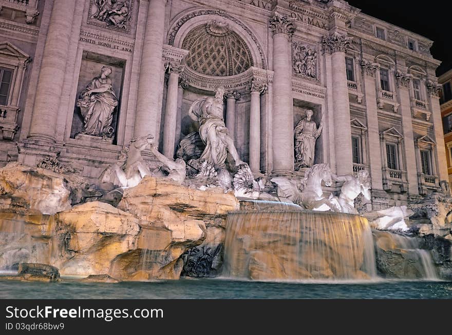 Famous fountain illuminated at night. Rome, Italy. Famous fountain illuminated at night. Rome, Italy