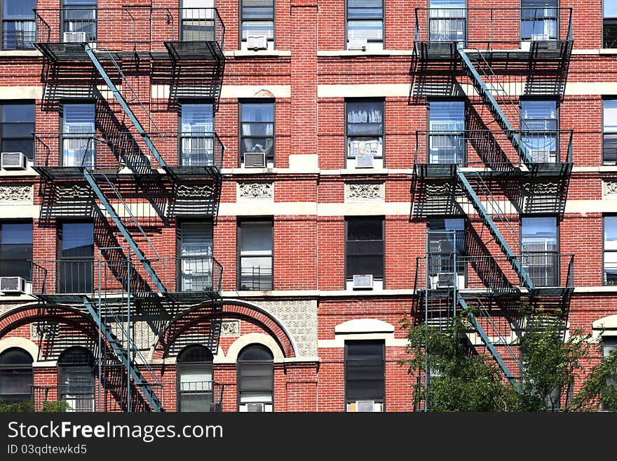 Fire ladder at old houses downtown in New York