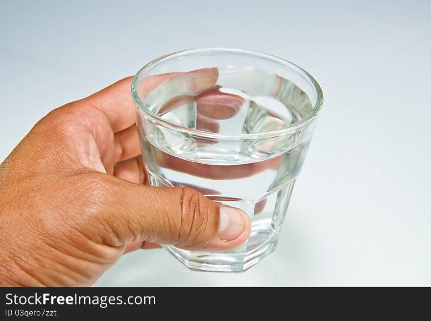 Hand with a water glass