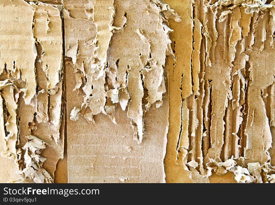 Ripped and scratch corrugated paper