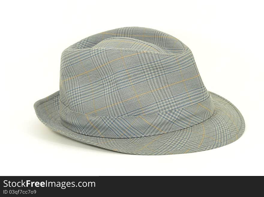 A grey hat with square pattern.