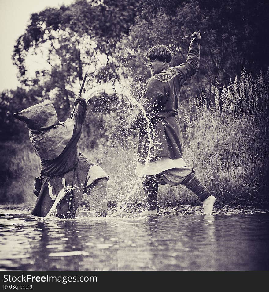 Mans in medieval suit outdoor shot. Mans in medieval suit outdoor shot