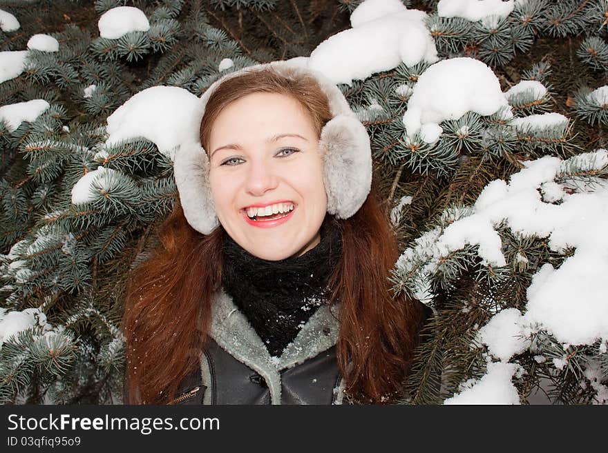 We see smiling young lady in the forest. We see smiling young lady in the forest.